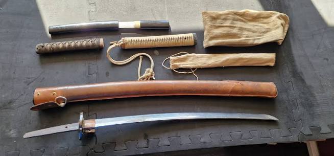 Katana fittings laid out for inspection
