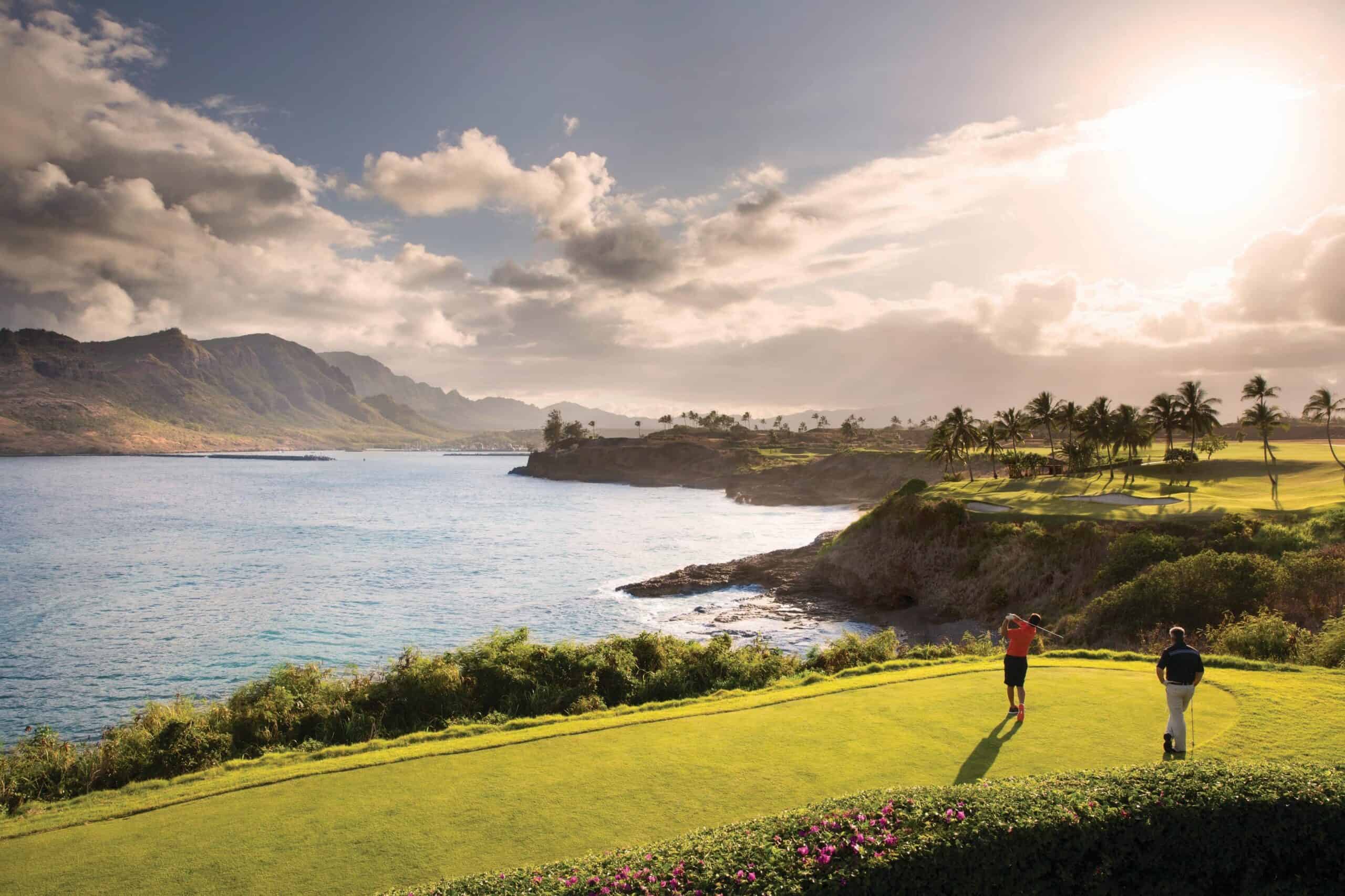 Scenic view of the golf course at the Royal Kauai Resort, surrounded by lush greenery in Kauai, Hawaii.
