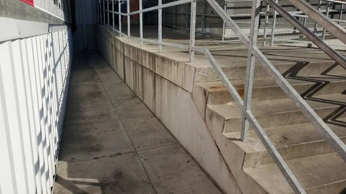Sidewalk concrete before cleaning — FedEx entry, Kansas City