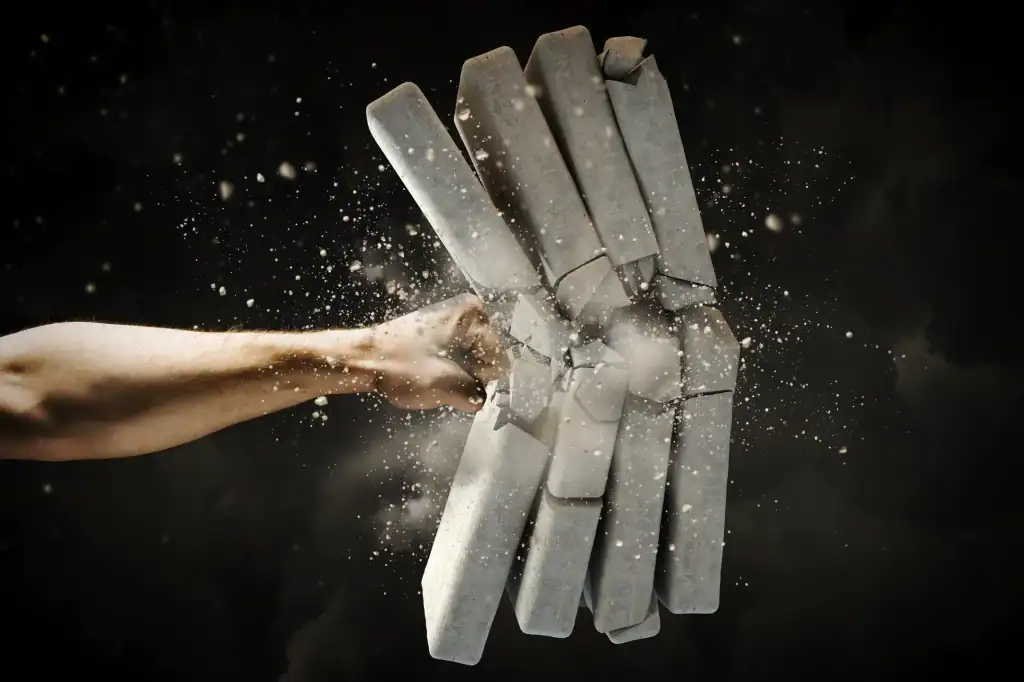 Concrete block breaking impact crash, destruction, force, demolition, damage, construction accident, legal implications, litigation, law firm, Kansas City law office, legal assistance, personal injury lawyer, Benjamin Arnold, KC DUI, legal services.