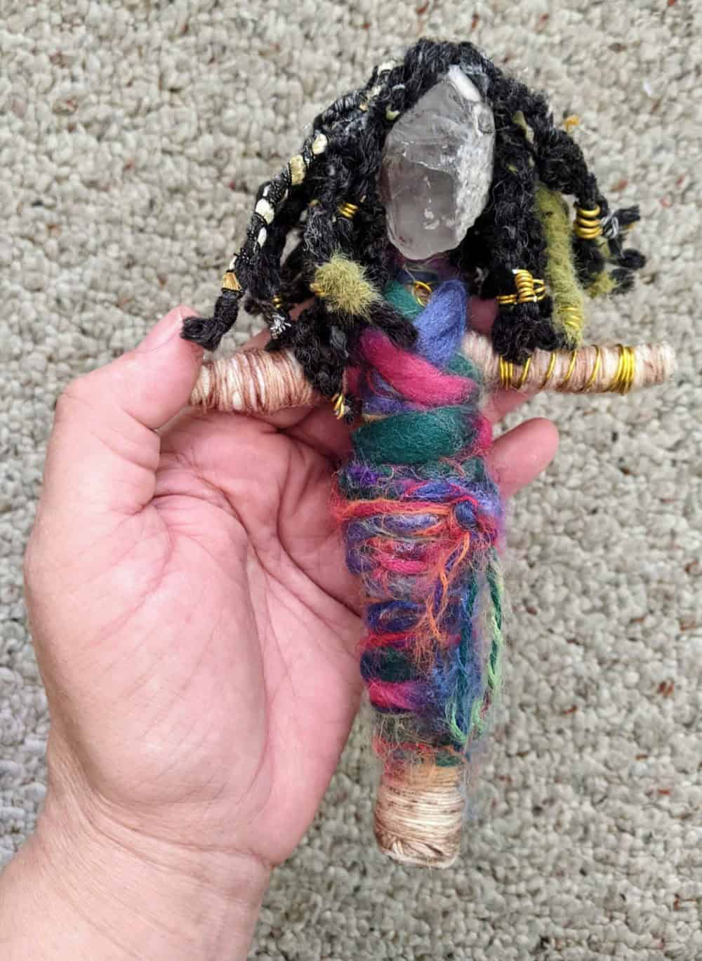 Quartz, 6-inch customizable You-Do-You Voodoo™ art doll highlighting multi-colored wrap dress, braided black hair and raw clear quartz crystal face.