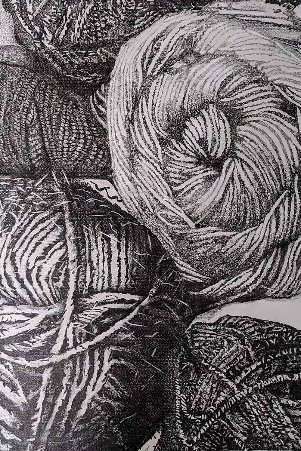 Graphite drawing of yarn titled "Compartmentalized Chaos," representing the tangled complexity of human thoughts and emotions.