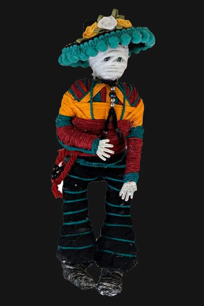 Front of the male Day of the Dead art doll. His base is a skeleton from Halloween garland.