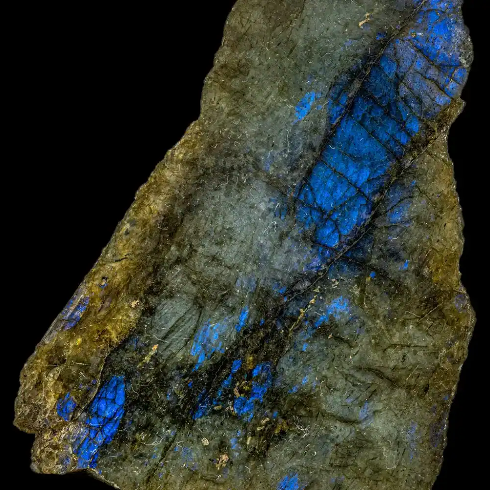 This stone has beautiful blues surrounded by grayish green rock.