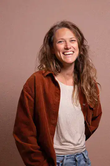 Woman smiling, casual portrait for Keplerfilm branding.