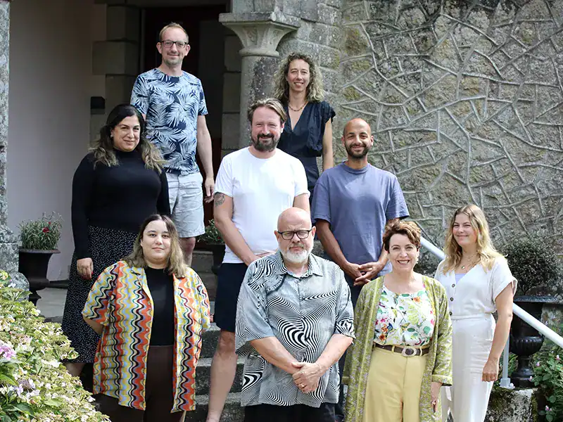 Team photo of Keplerfilm production company members outdoors.