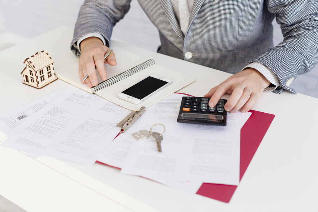 crop realtor counting with calculator