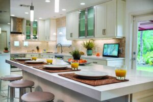 Modern kitchen renovation with quartz island, custom cabinetry, and pendant lighting37