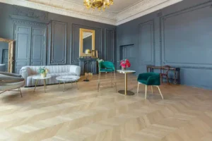 chic-interior-room-renaissance-style-19th-century-with-modern-luxury-furniture-walls-noble-dark-color-are-decorated-with-stucco-gilded-frames-wooden