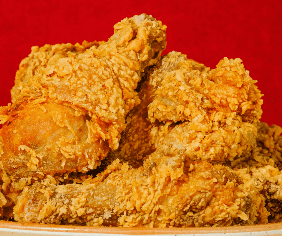 Crispy fried chicken pieces for catering, delicious Southern-style fried chicken for events and parties.