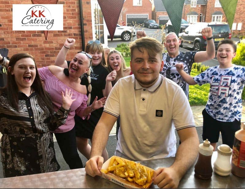 Delicious catering food served at a lively outdoor event by KK Catering UK.