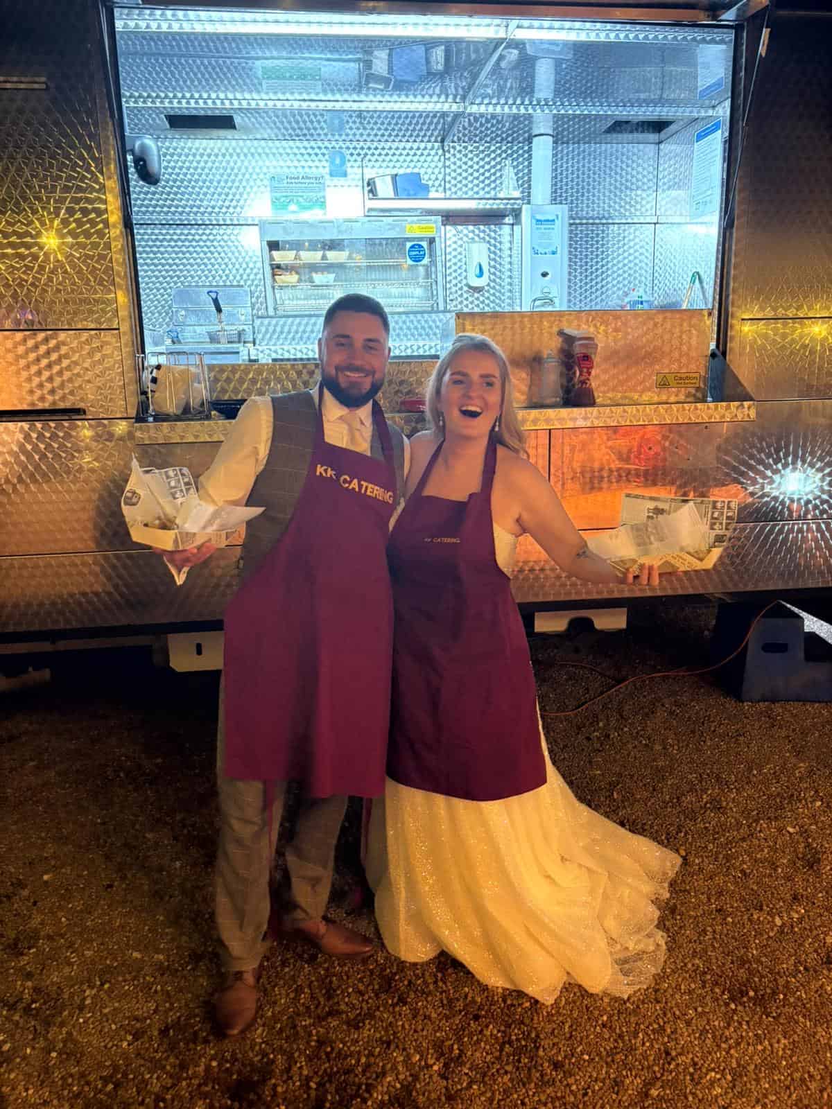 Delicious street food served by happy staff at KK Catering food truck.