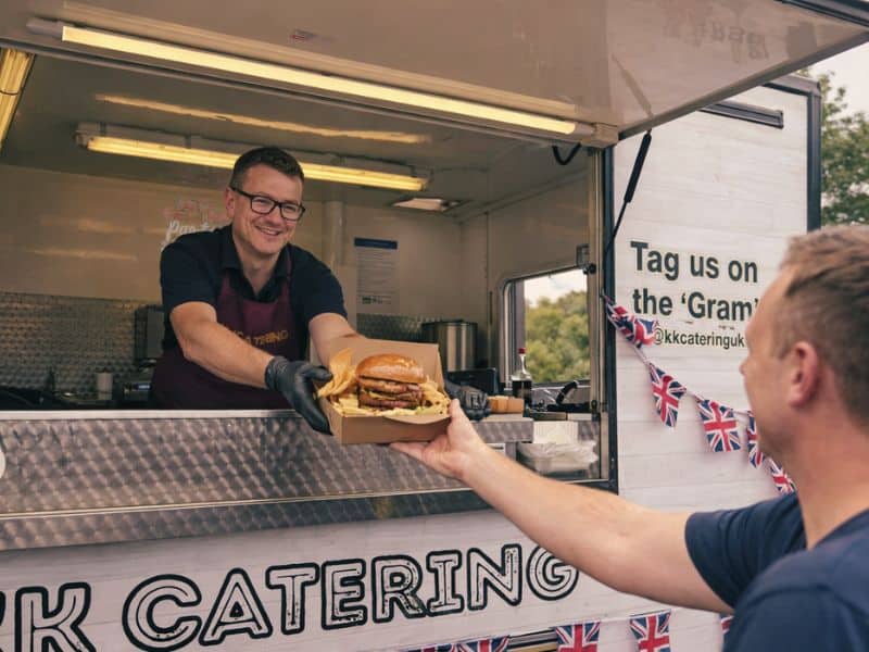 Delicious burger served via KK Catering food truck in the UK, for catering and event services.