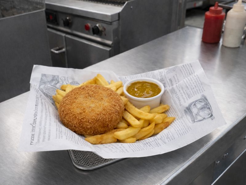 Lincolnshire fishcake with chips and curry sauce from KK Catering fish and chip van