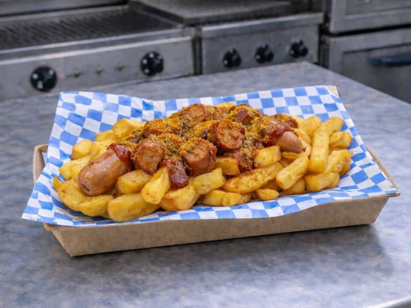 Currywurst with Bavarian curry ketchup served at a KK Catering corporate event.