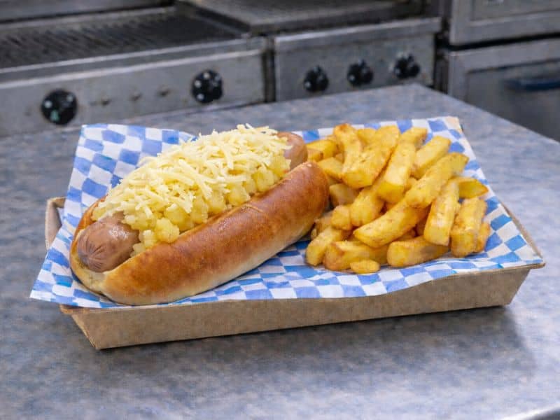 Hawaiian Wurst pork sausage with pineapple and sweet chilli served at a KK Catering event.