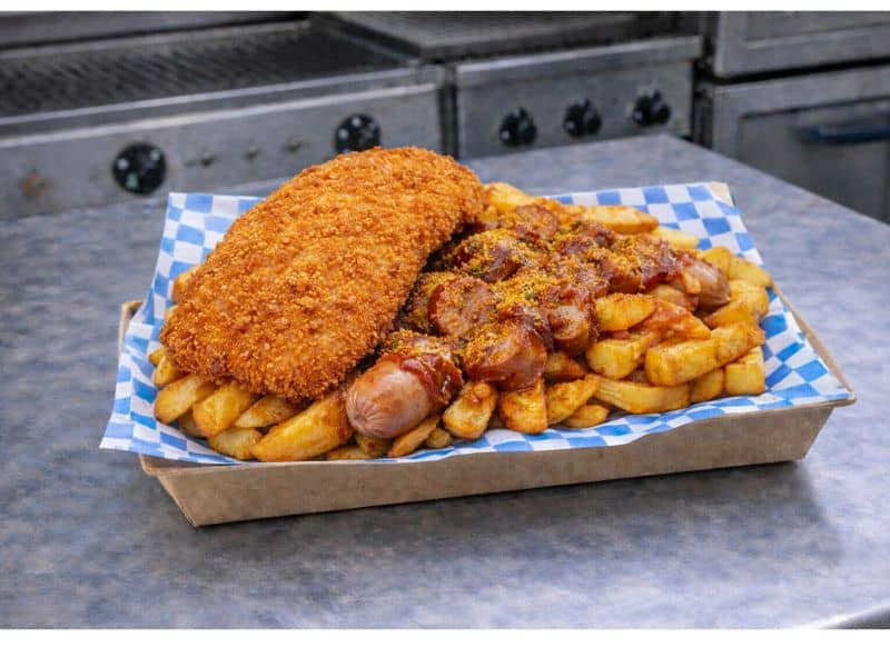 Chicken schnitzel upgrade available from KK Catering's bratwurst van hire service.