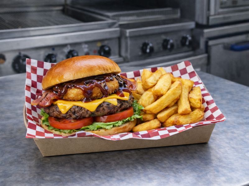 Gourmet Big Western burger and chips from KK Catering premium burger van.