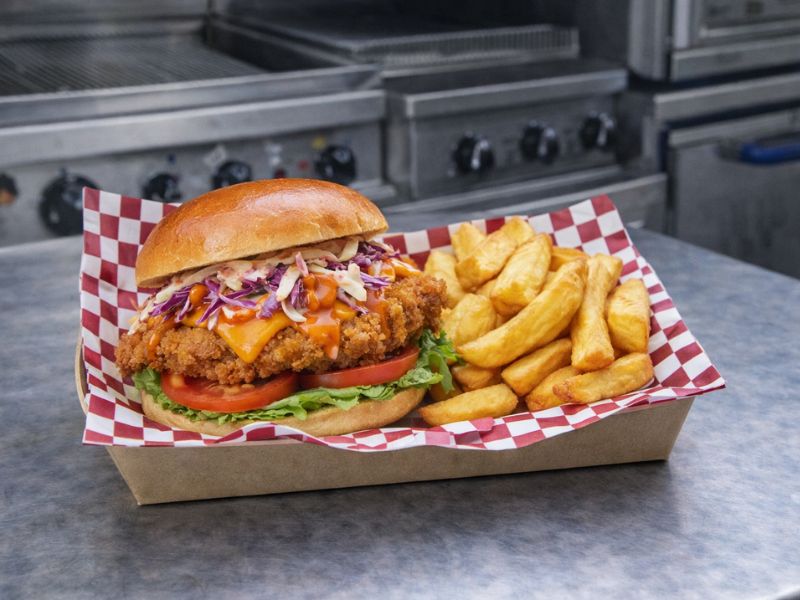 Piri piri chicken sandwich with chips from KK Catering gourmet burger van hire.