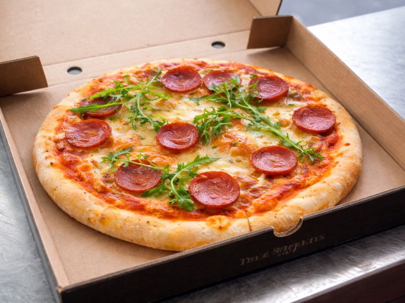 Pepperoni Pleaser pizza with succulent pepperoni, parmesan and rocket from KK Catering pizza van hire.