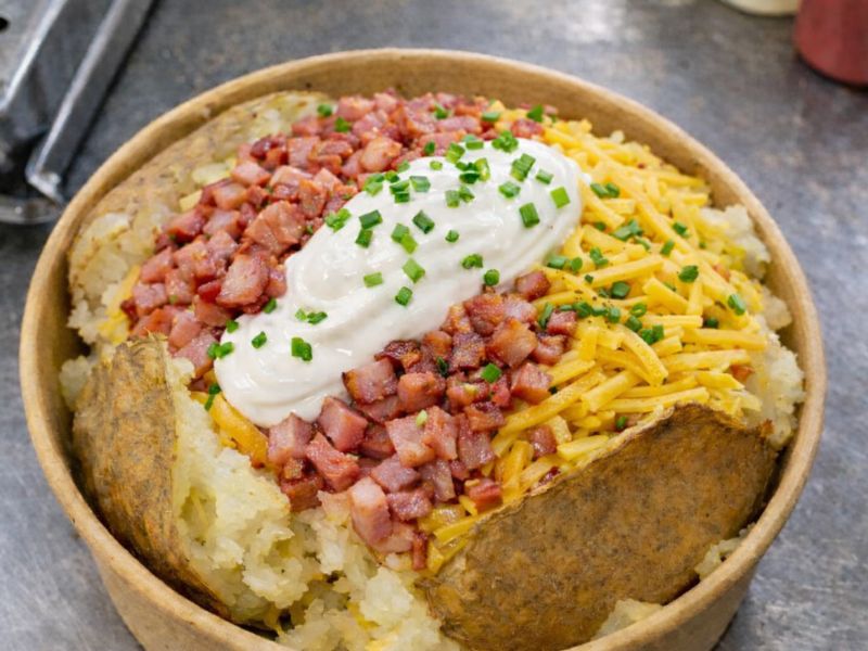 Hamlet's Choice gourmet baked potato — smoked ham and cheddar with sour cream and chives.