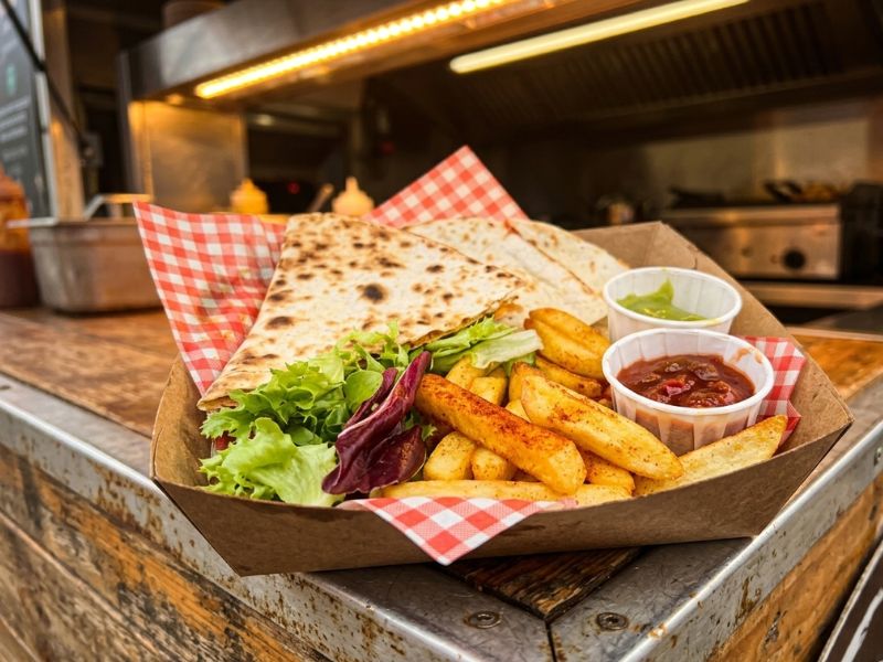 Quesadilla with fries from Kantina Diablos Mexican catering van.