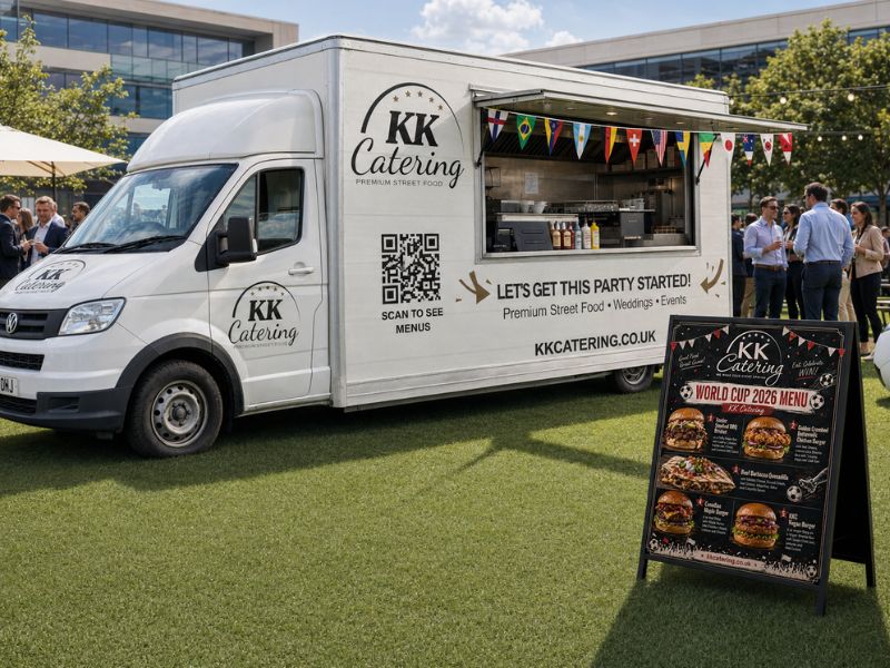Catering van with KK Catering branding, serving premium street food at outdoor events and festivals.
