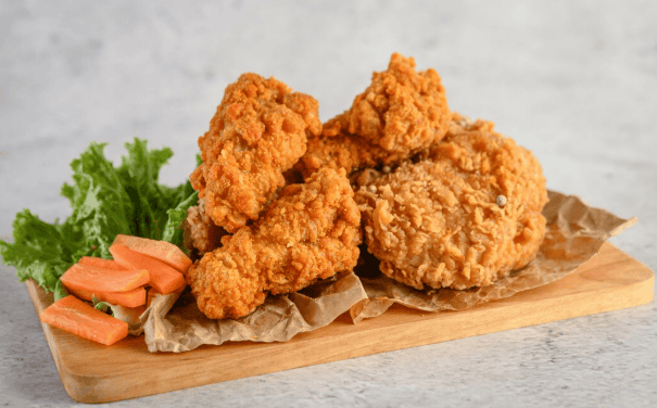 Korean fried chicken pieces glazed with spicy-sweet sauce.
