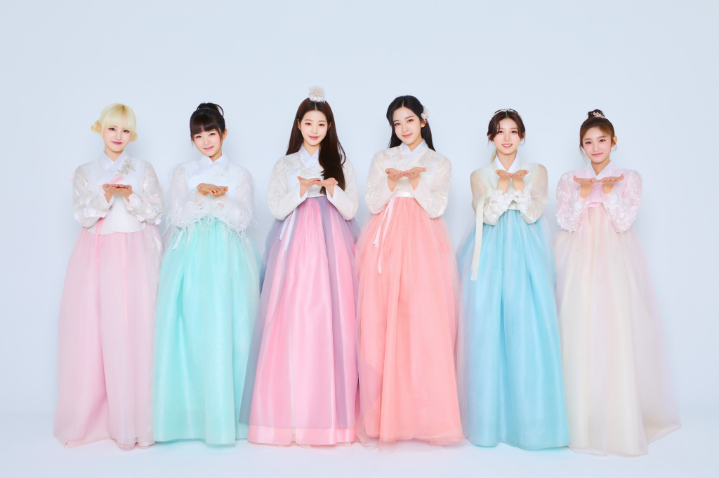 K-pop girl group IVE wearing traditional Korean hanbok for Lunar New Year celebration