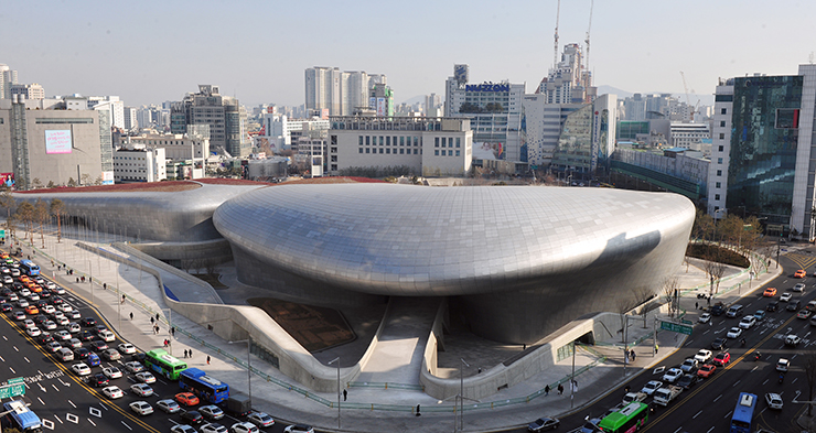 Futuristic view of Dongdaemun Design Plaza (DDP) at night.