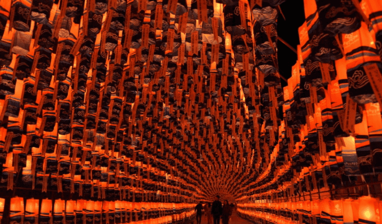 Lanterns floating on the Namgang River during Jinju Lantern Festival.