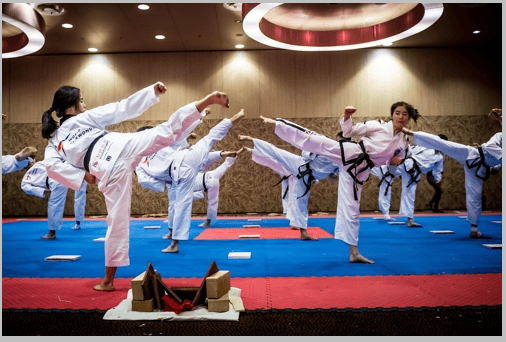 People practicing taekwondo, traditional Korean martial art