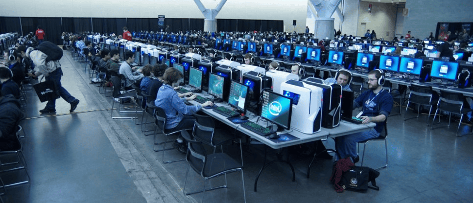 Interior view of a Korean PC bang internet cafe with gamers playing on computers
