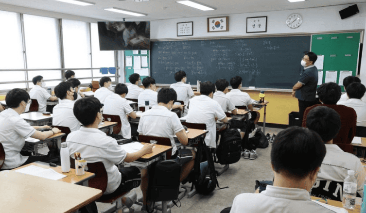 Korean students studying in a classroom.