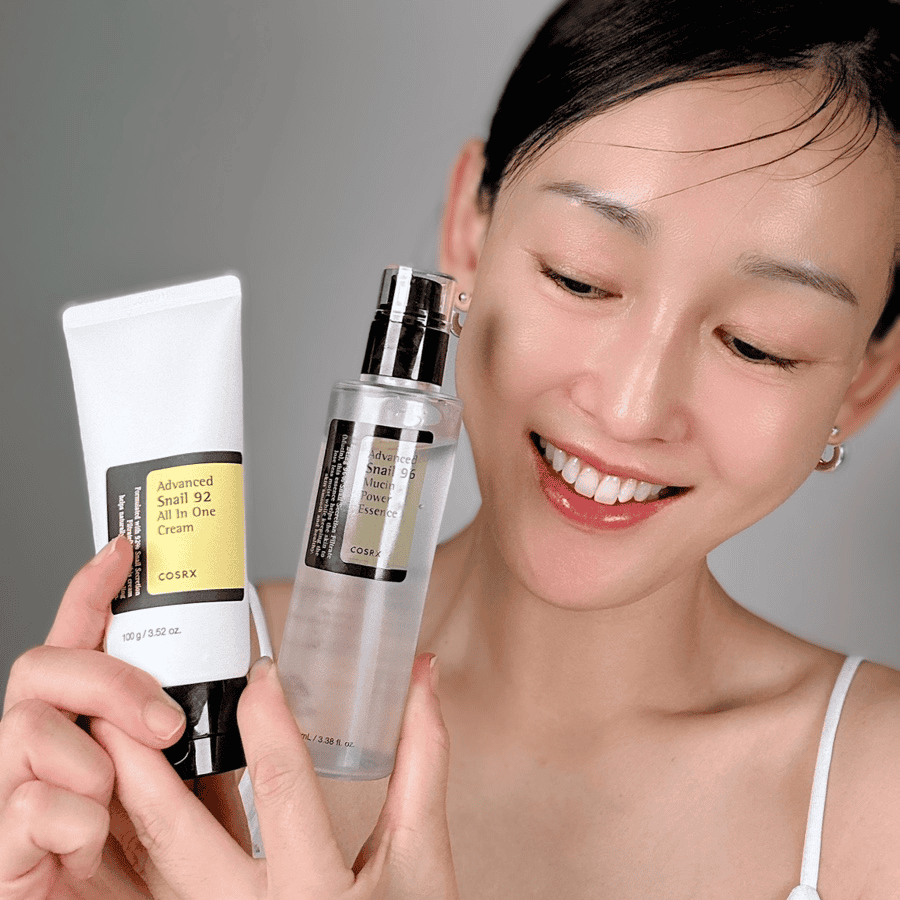 COSRX Advanced Snail 96 Mucin Essence bottle on neutral background