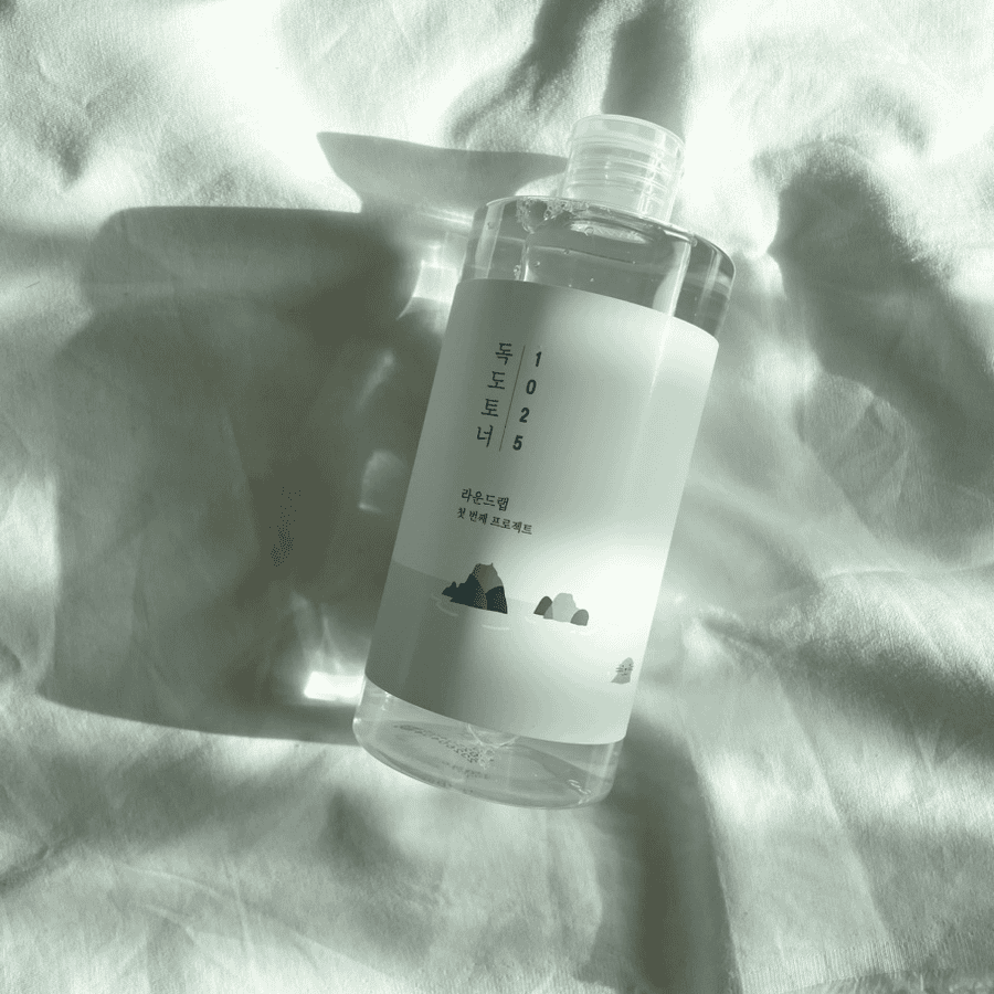 Round Lab Dokdo Toner bottle with water droplets
