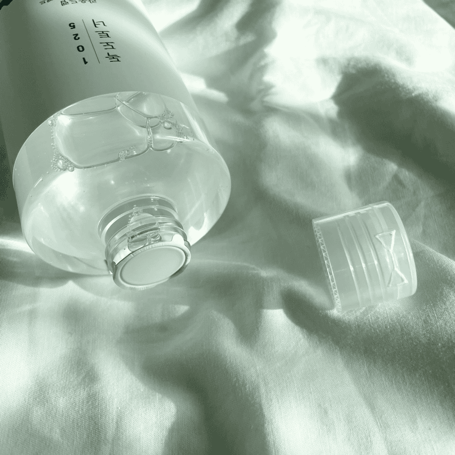 Round Lab Dokdo Toner bottle with water droplets