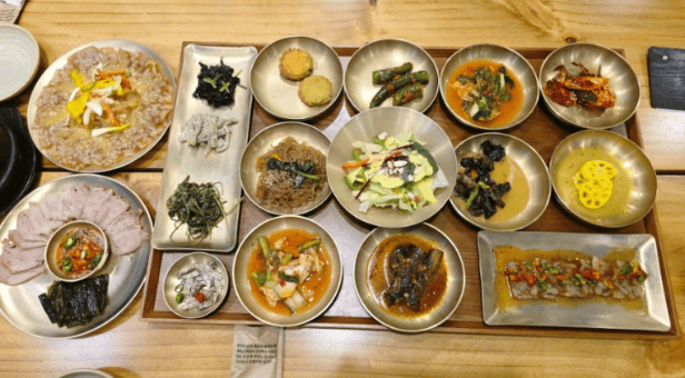 A balanced Korean meal with rice, kimchi, and fermented side dishes.