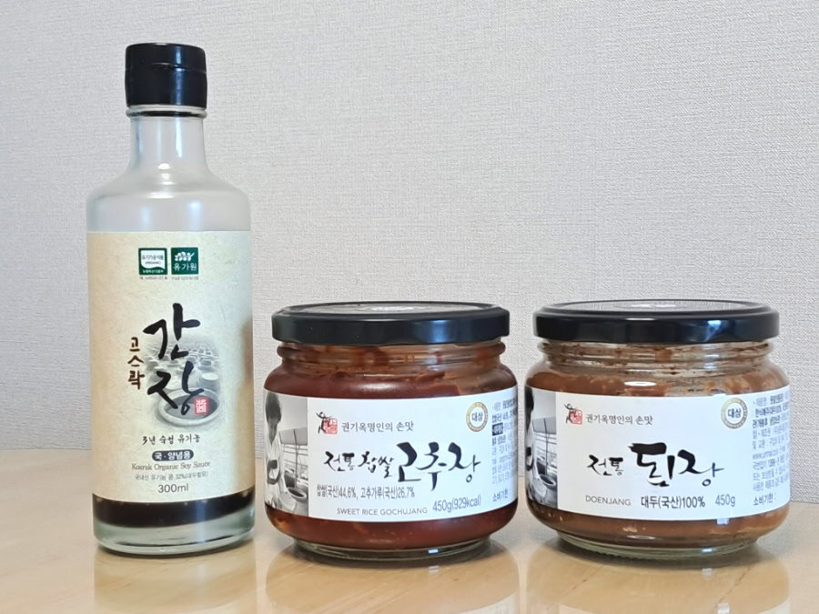 Korean condiments including gochujang, soy sauce, and doenjang jars.