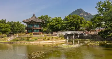 Hyangwonjeong Pavilion and Chwihyanggyo Bridge at Gyeongbokgung Palace with blue sky in Seoul