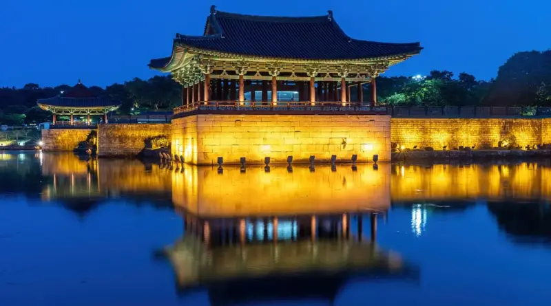 Water reflection of Donggung Palace in Wolji Pond at blue hour in Gyeongju South Korea