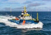 De noodhulpsleper van de Kustwacht, Multraship Protector ligt op zee paraat in de buurt van de windparken Hollandse Kust