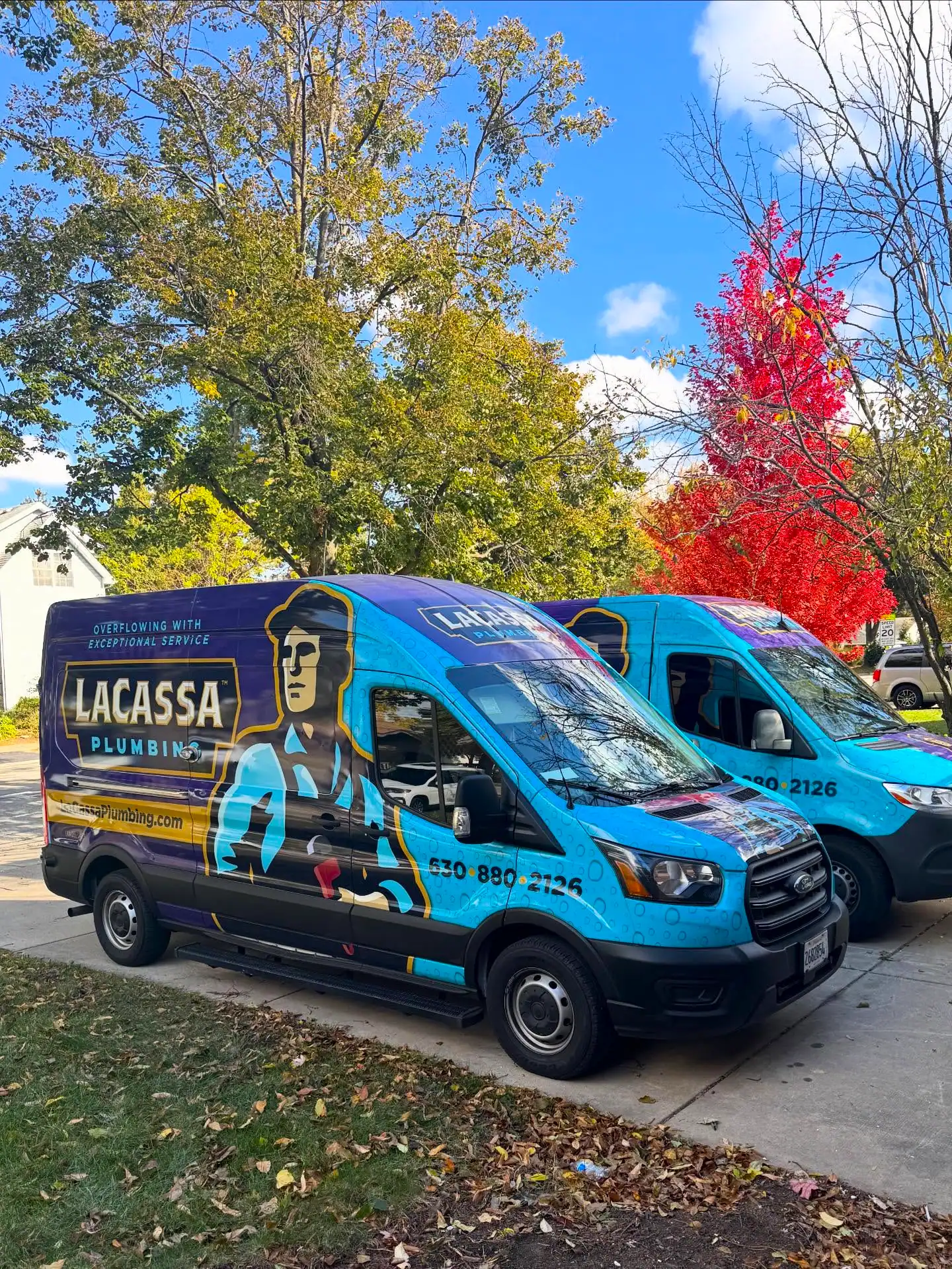 LaCassa-Plumbing-Branded-Service-Vans-Parked-Outside