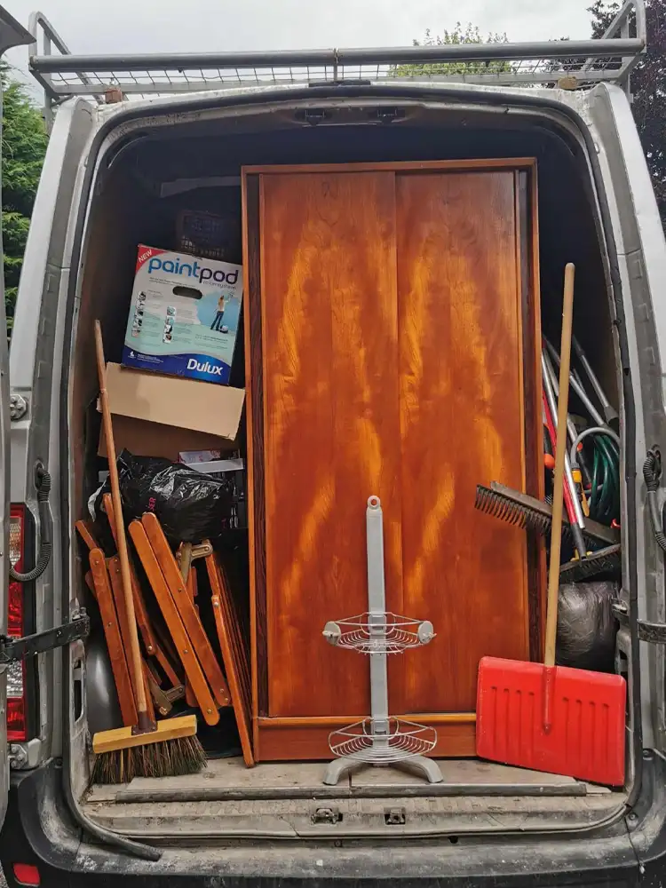 An open van full of furniture