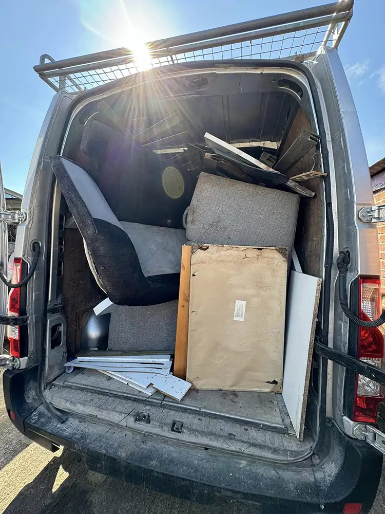 An open van full of furniture