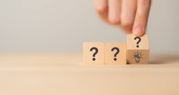 question marks and light bulb symbolizing