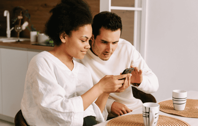 Couple checking phone
