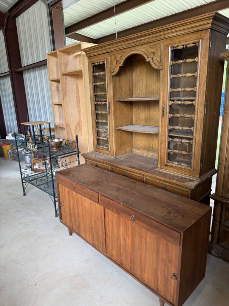 Antique wooden hutch with glass-paneled doors and a sideboard for sale.