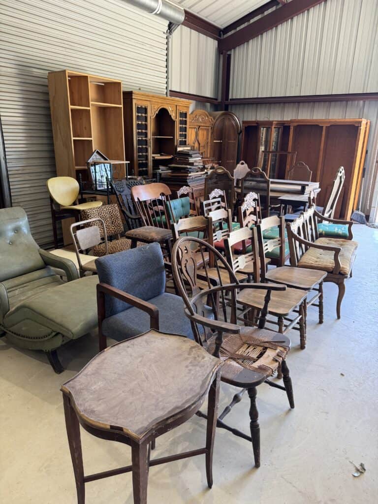 Collection of vintage chairs and furniture at Mike Luckey Estate Auction.