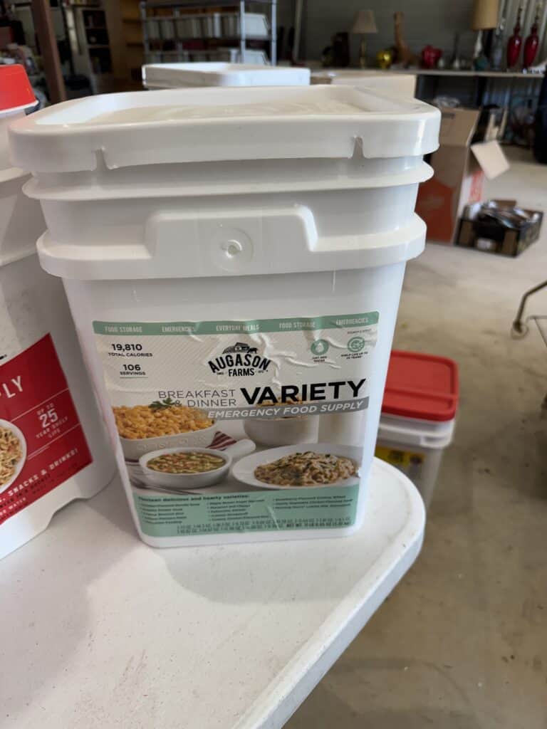 White plastic food storage container with breakfast and dinner options label.